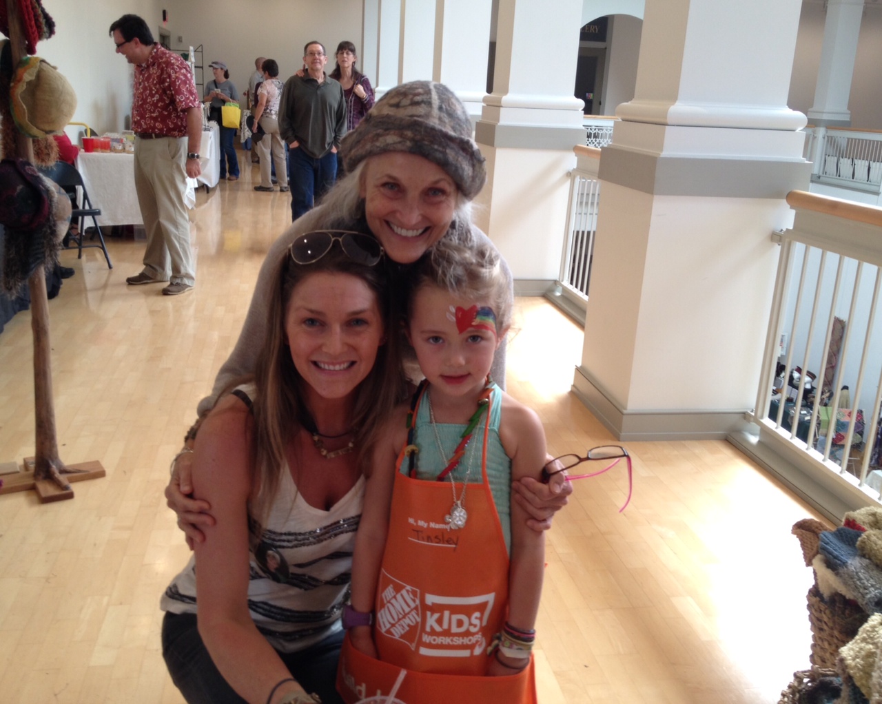 Vendor Tina Tinsley with her daughter and granddaughter..JPG