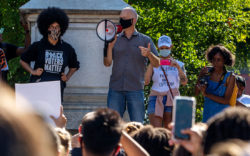 Mariah Parker and Kelly Girtz at protest in front of Confederate Memorial